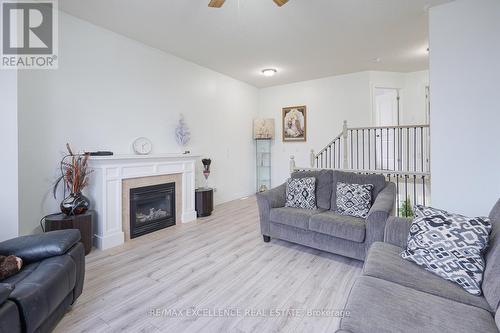 1860 Devos Drive, London, ON - Indoor Photo Showing Living Room With Fireplace