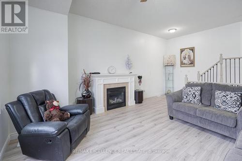 1860 Devos Drive, London, ON - Indoor Photo Showing Living Room With Fireplace