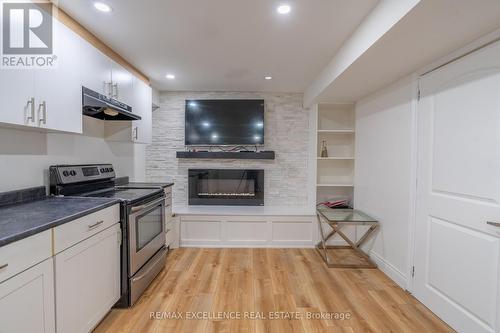 7 Gaydon Way, Brant, ON - Indoor Photo Showing Kitchen With Fireplace