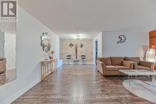 1002 - 5 Lisa Street, Brampton, ON - Indoor Photo Showing Living Room