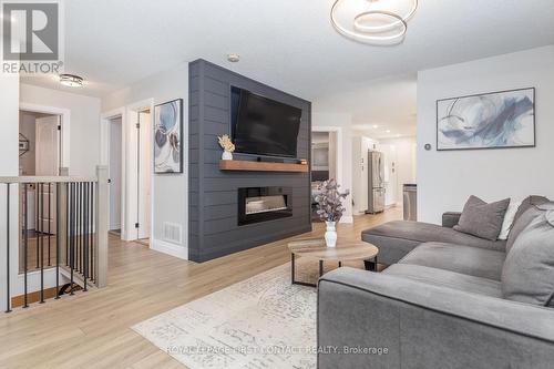 72 Gore Drive, Barrie, ON - Indoor Photo Showing Living Room With Fireplace