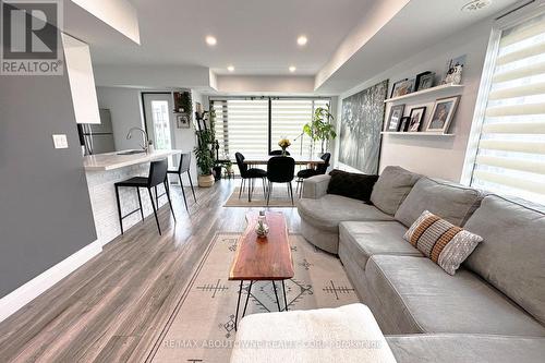 417 - 130 Widdicombe Hill Boulevard, Toronto, ON - Indoor Photo Showing Living Room