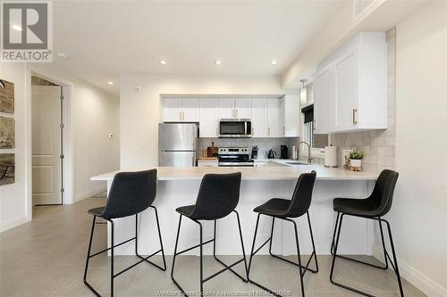 233 Watson Unit# 205, Windsor, ON - Indoor Photo Showing Kitchen With Stainless Steel Kitchen With Upgraded Kitchen