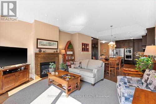 14 Merrill Drive, Prince Edward County (Wellington), ON - Indoor Photo Showing Living Room With Fireplace