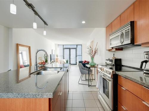 304-760 Johnson St, Victoria, BC - Indoor Photo Showing Kitchen With Double Sink