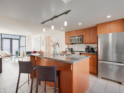 304-760 Johnson St, Victoria, BC - Indoor Photo Showing Kitchen With Double Sink