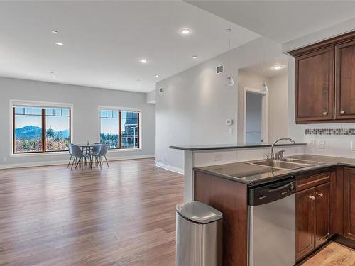 405-1335 Bear Mountain Pkwy, Langford, BC - Indoor Photo Showing Kitchen With Double Sink