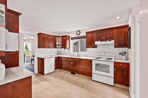 138 Millard Place, Kelowna, BC - Indoor Photo Showing Kitchen With Double Sink