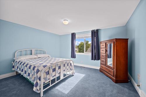 138 Millard Place, Kelowna, BC - Indoor Photo Showing Bedroom