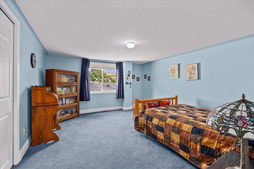 138 Millard Place, Kelowna, BC - Indoor Photo Showing Bedroom