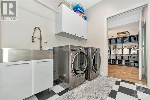 Main Floor Laundry - 3010 Torwood Drive, Dunrobin, ON - Indoor Photo Showing Laundry Room