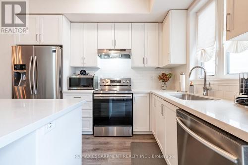 149 - 1890 Rymal Road E, Hamilton, ON - Indoor Photo Showing Kitchen With Upgraded Kitchen