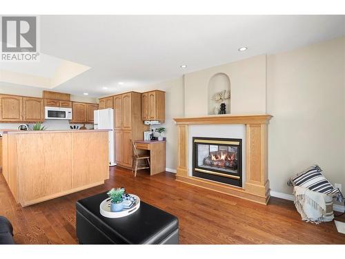 2592 Alpen Paradies Road Unit# 12, Blind Bay, BC - Indoor Photo Showing Living Room With Fireplace