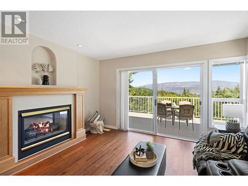 2592 Alpen Paradies Road Unit# 12, Blind Bay, BC - Indoor Photo Showing Living Room With Fireplace