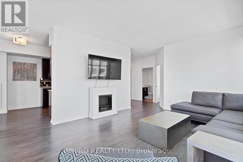 2302 - 65 East Liberty Street, Toronto, ON - Indoor Photo Showing Living Room With Fireplace