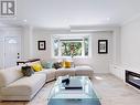 Main - 657 Pharmacy Avenue, Toronto, ON  - Indoor Photo Showing Living Room With Fireplace 