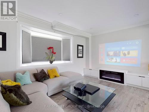 Main - 657 Pharmacy Avenue, Toronto, ON - Indoor Photo Showing Living Room With Fireplace