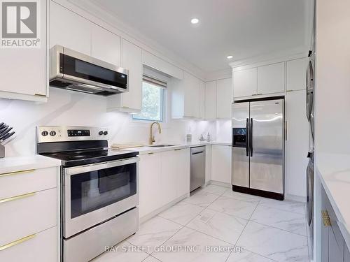 Main - 657 Pharmacy Avenue, Toronto, ON - Indoor Photo Showing Kitchen With Upgraded Kitchen