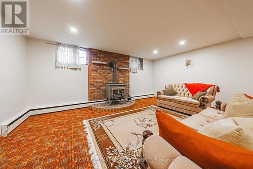 83 South Bend Road, Hamilton, ON - Indoor Photo Showing Basement With Fireplace