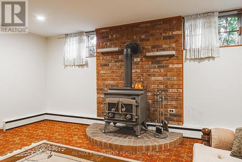 83 South Bend Road, Hamilton, ON - Indoor With Fireplace