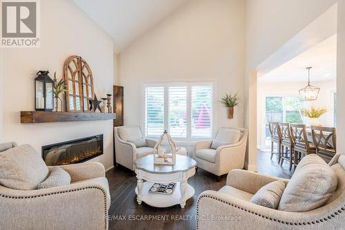 100 Boulding Avenue, Hamilton, ON - Indoor Photo Showing Living Room With Fireplace