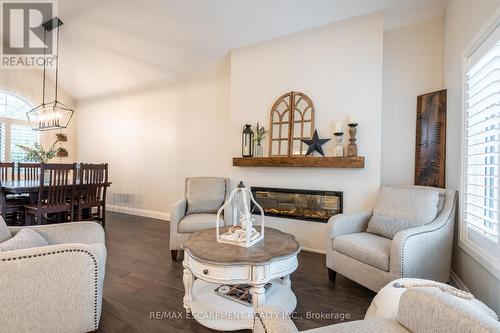 100 Boulding Avenue, Hamilton, ON - Indoor Photo Showing Living Room With Fireplace