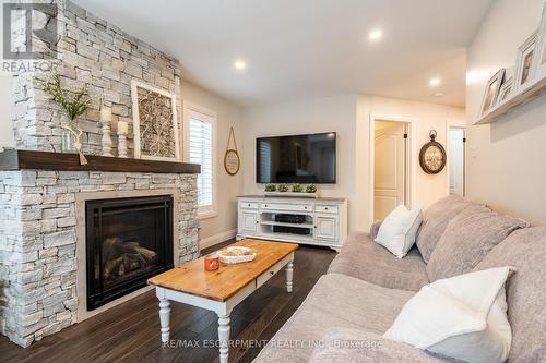 100 Boulding Avenue, Hamilton, ON - Indoor Photo Showing Living Room With Fireplace