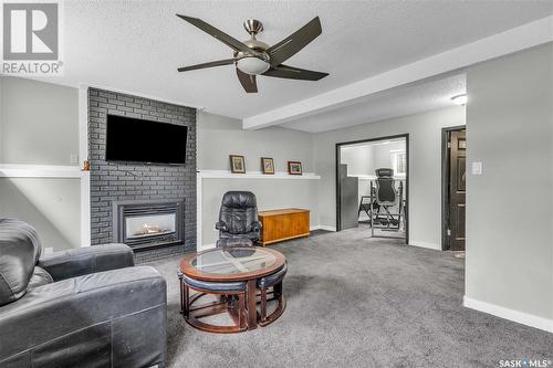 3810 Balfour Place, Saskatoon, SK - Indoor Photo Showing Living Room With Fireplace