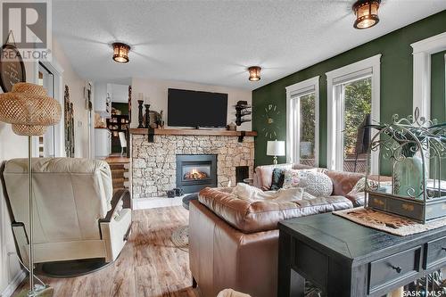 414 Charlebois Court, Saskatoon, SK - Indoor Photo Showing Living Room With Fireplace