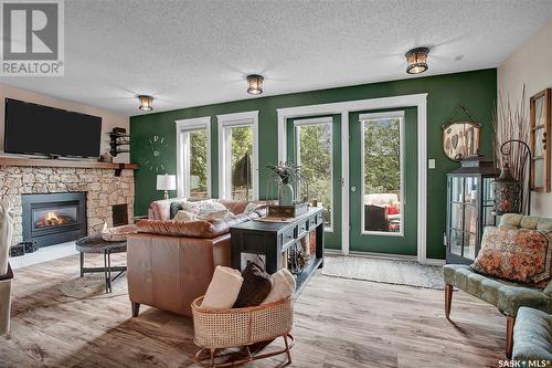 414 Charlebois Court, Saskatoon, SK - Indoor Photo Showing Living Room With Fireplace