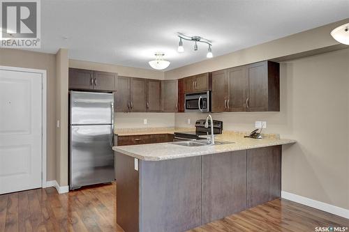 213 2341 Windsor Park Road, Regina, SK - Indoor Photo Showing Kitchen With Stainless Steel Kitchen