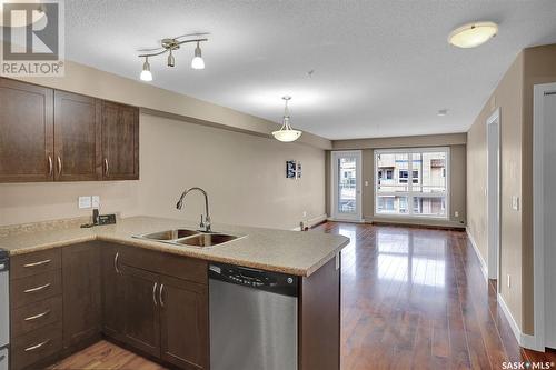 213 2341 Windsor Park Road, Regina, SK - Indoor Photo Showing Kitchen With Double Sink