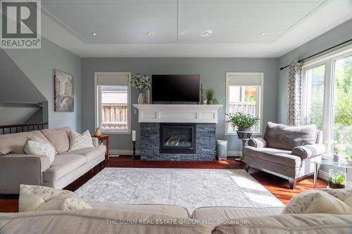 6637 Upper Canada Crossing, London, ON - Indoor Photo Showing Living Room With Fireplace