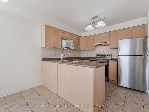 113-5530 Glen Erin Dr, Mississauga, ON - Indoor Photo Showing Kitchen