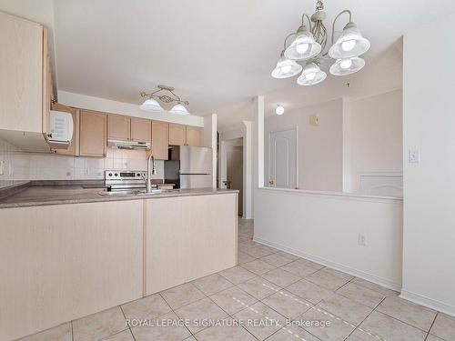 113-5530 Glen Erin Dr, Mississauga, ON - Indoor Photo Showing Kitchen