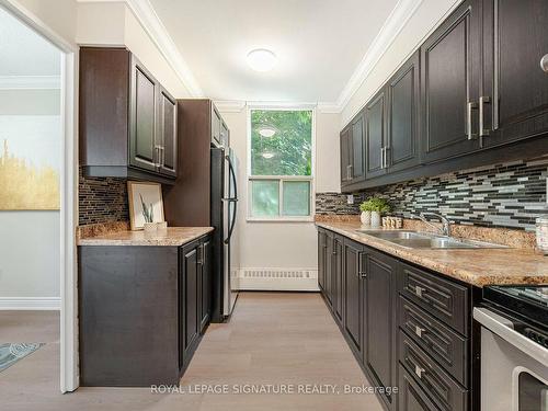 319-551 The West Mall, Toronto, ON - Indoor Photo Showing Kitchen With Double Sink