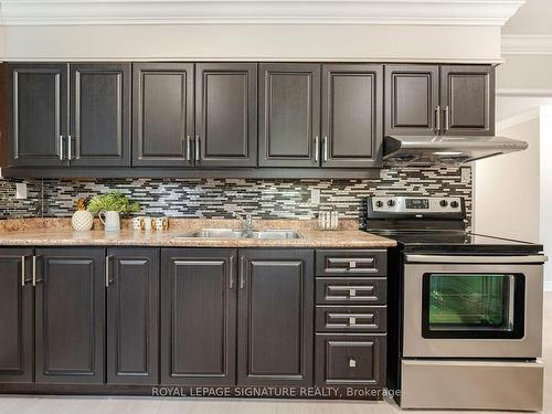 319-551 The West Mall, Toronto, ON - Indoor Photo Showing Kitchen With Double Sink With Upgraded Kitchen