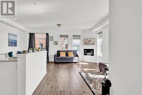 31 Bushwood Trail, Brampton, ON - Indoor Photo Showing Living Room With Fireplace