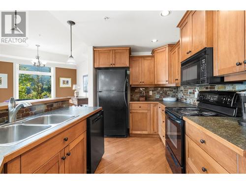 611 Shuswap Street Sw Unit# 103, Salmon Arm, BC - Indoor Photo Showing Kitchen With Double Sink