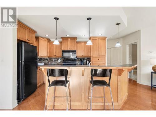 611 Shuswap Street Sw Unit# 103, Salmon Arm, BC - Indoor Photo Showing Kitchen With Upgraded Kitchen