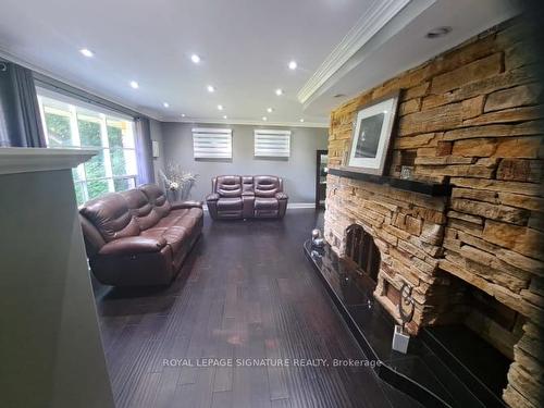 19 Shepherd Rd, Whitby, ON - Indoor With Fireplace