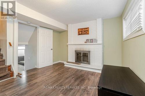 13 Weybridge Trail, Brampton, ON - Indoor Photo Showing Living Room With Fireplace