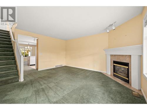 3825 Glen Canyon Drive Unit# 105, West Kelowna, BC - Indoor With Fireplace