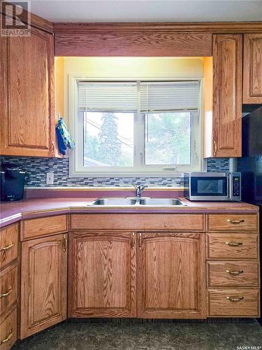 1116 Main Street, Rosetown, SK - Indoor Photo Showing Kitchen With Double Sink