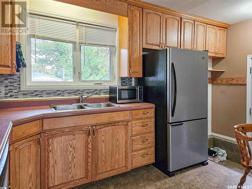 1116 Main Street, Rosetown, SK - Indoor Photo Showing Kitchen With Double Sink