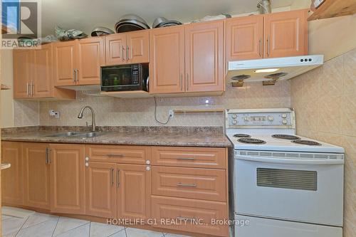 1039 - 100 Mornelle Court, Toronto, ON - Indoor Photo Showing Kitchen With Double Sink