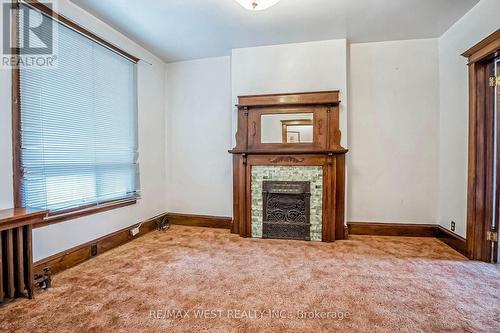 10 Afton Avenue, Toronto, ON - Indoor Photo Showing Other Room With Fireplace