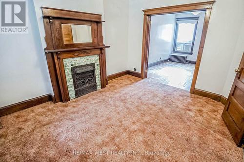 10 Afton Avenue, Toronto, ON - Indoor Photo Showing Other Room With Fireplace