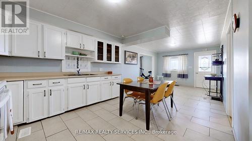 7811 Highway 89, Adjala-Tosorontio, ON - Indoor Photo Showing Kitchen With Double Sink