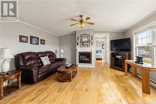 9 Avery Street, Moncton, NB - Indoor Photo Showing Living Room With Fireplace